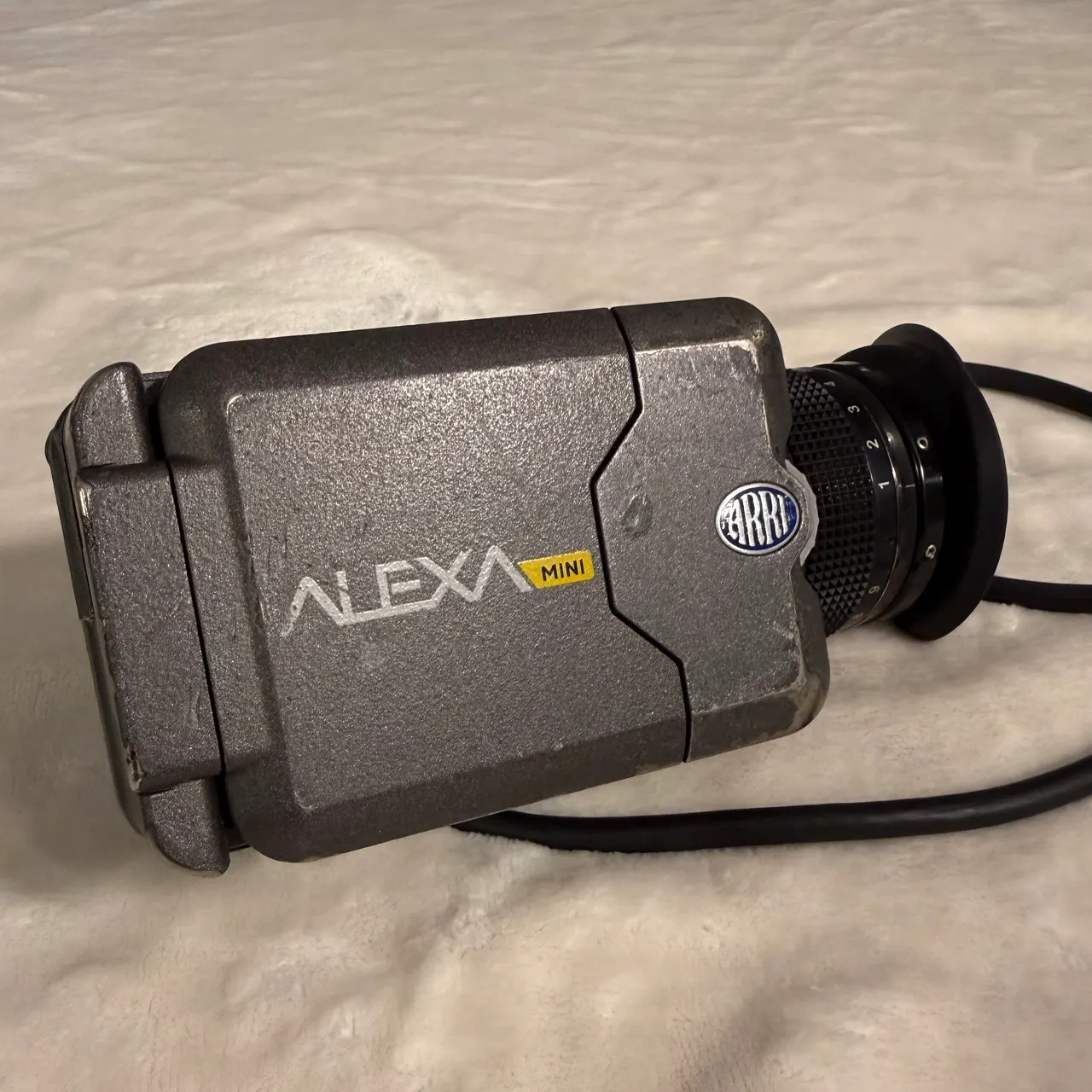 The MVF-1 viewfinder, side view with eyecup and cable.